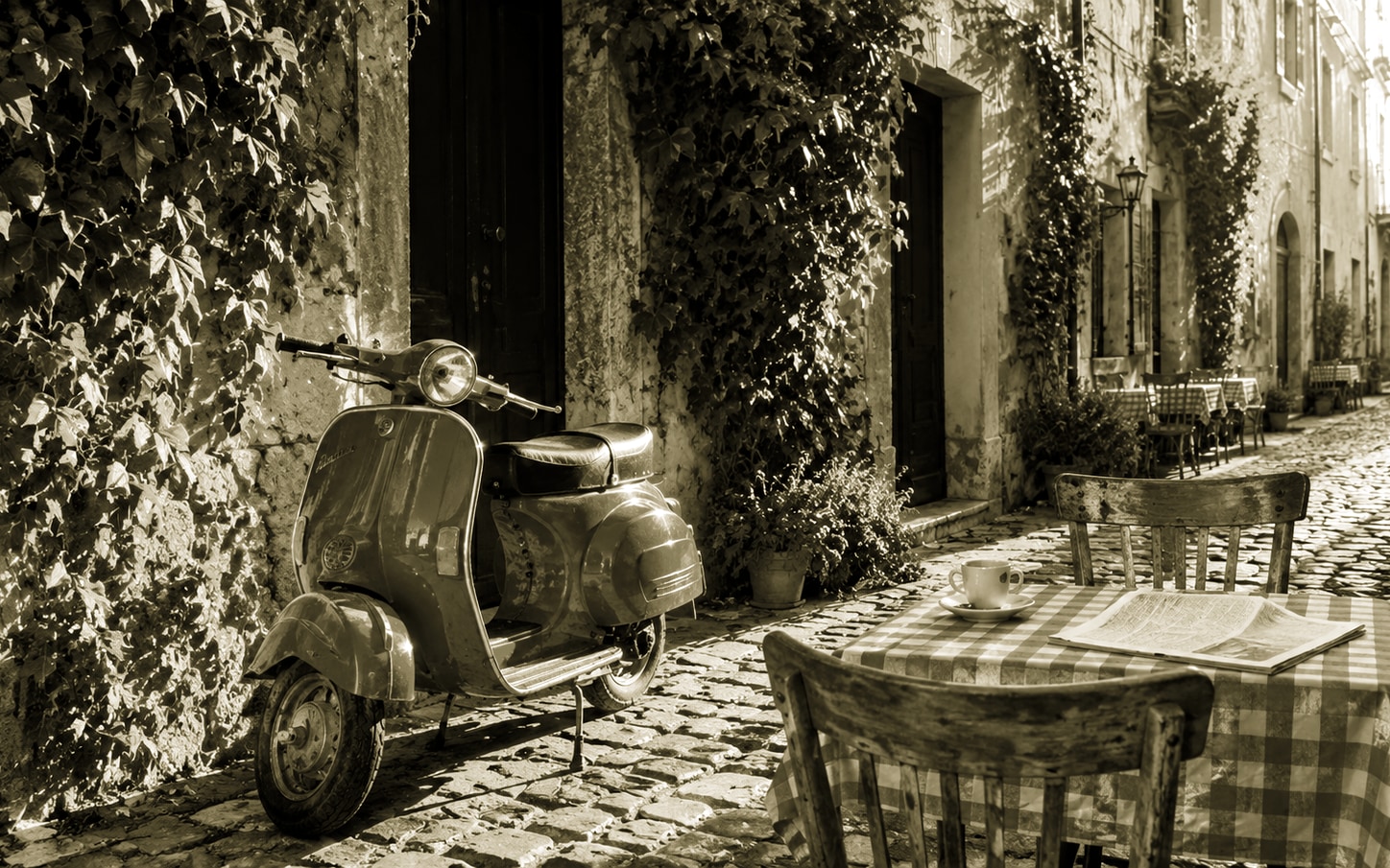 Vintage Vespa cafe scene with Kodak Gold film preset, warm golden tones with moderate grain